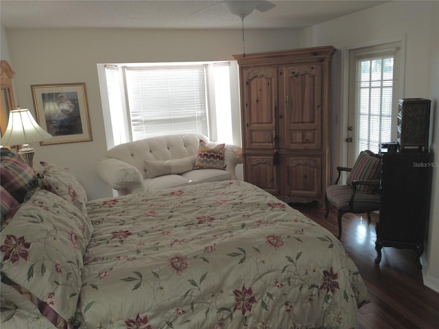 bedroom featuring dark hardwood / wood-style floors