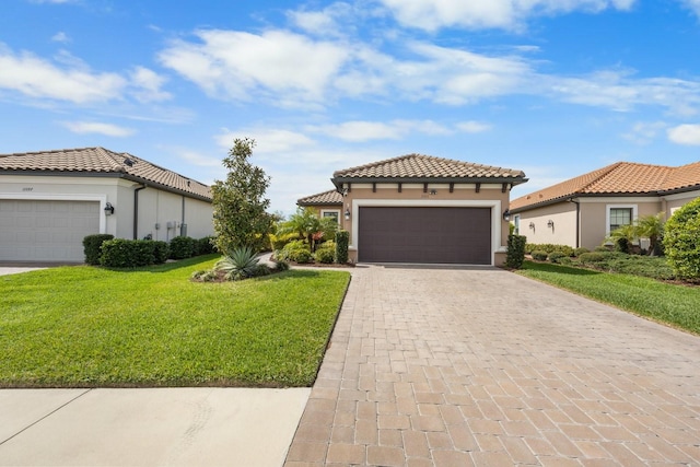 mediterranean / spanish-style house with a front yard