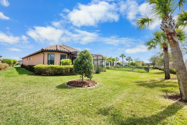 view of yard featuring a lanai