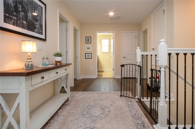 hall featuring dark hardwood / wood-style flooring