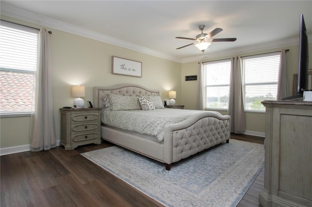 bedroom with crown molding, ceiling fan, and dark hardwood / wood-style floors