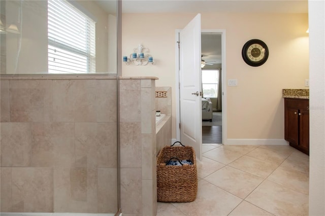 bathroom featuring tile patterned flooring and vanity