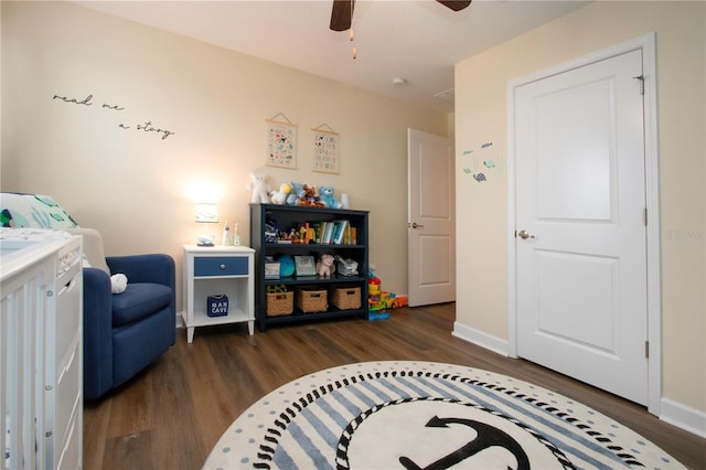 interior space featuring dark hardwood / wood-style floors and ceiling fan