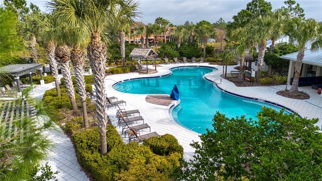 view of swimming pool with a gazebo and a patio area