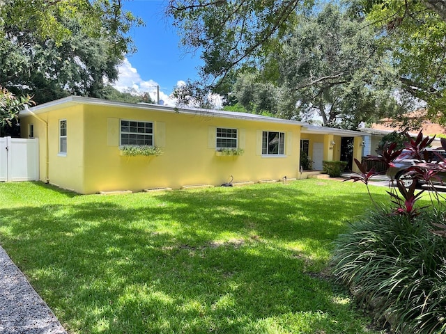 view of front of home with a front yard