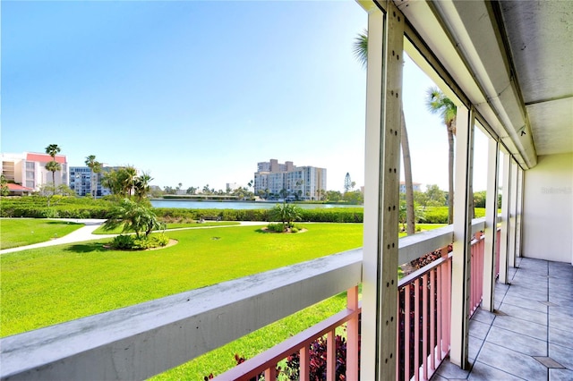 balcony featuring a water view