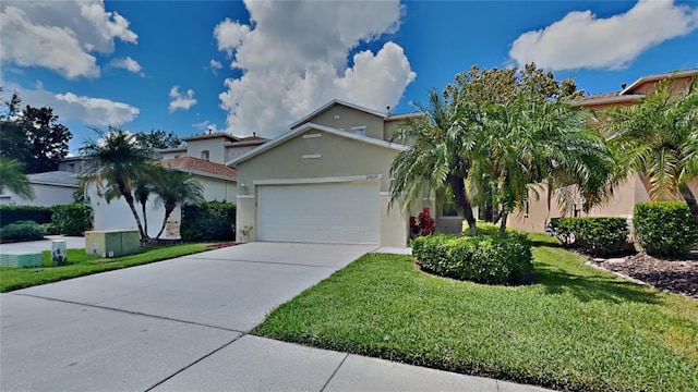 view of front of house featuring a garage and a front yard