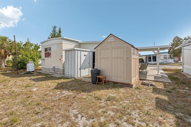 view of outdoor structure with a yard