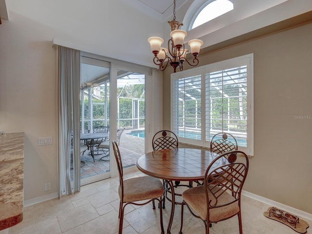 dining area with a notable chandelier