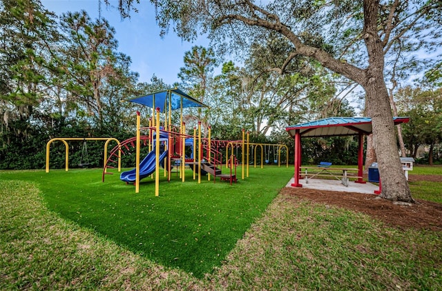 view of playground featuring a lawn