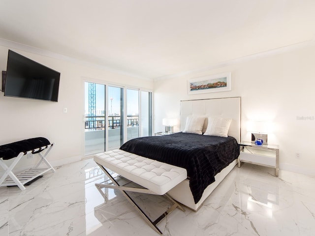 bedroom featuring ornamental molding and access to exterior