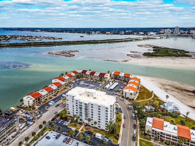 aerial view featuring a water view and a view of the beach