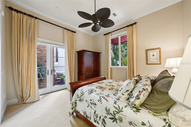 bedroom featuring light carpet, visible vents, access to outside, french doors, and crown molding