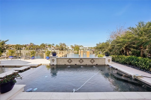 dock area featuring a water view