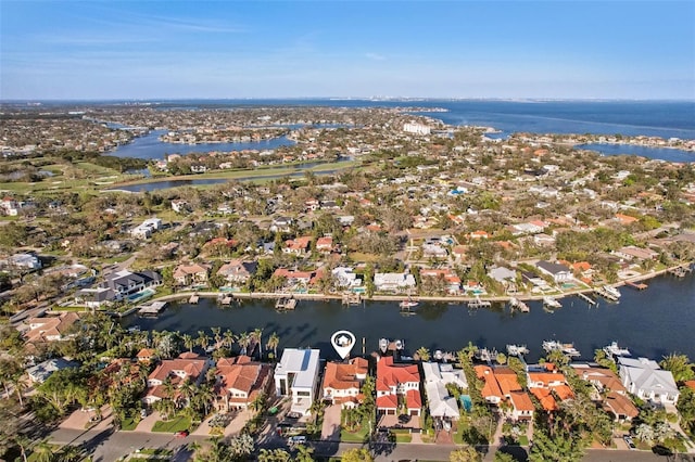 bird's eye view with a residential view and a water view