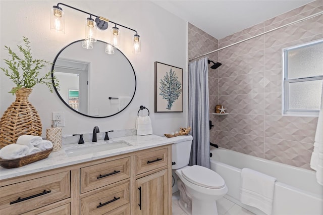 full bathroom featuring vanity, shower / bath combination with curtain, tile patterned floors, and toilet