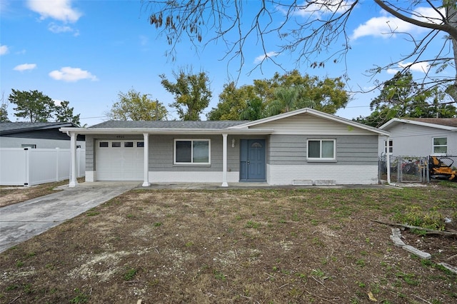 single story home featuring a garage