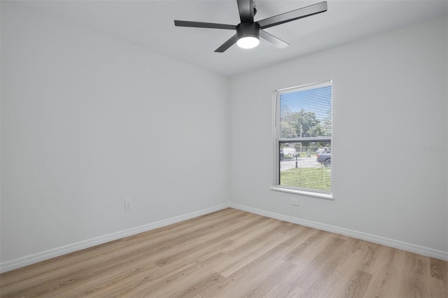 unfurnished room with ceiling fan and light hardwood / wood-style floors