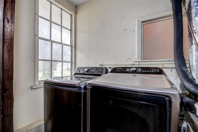 washroom featuring separate washer and dryer