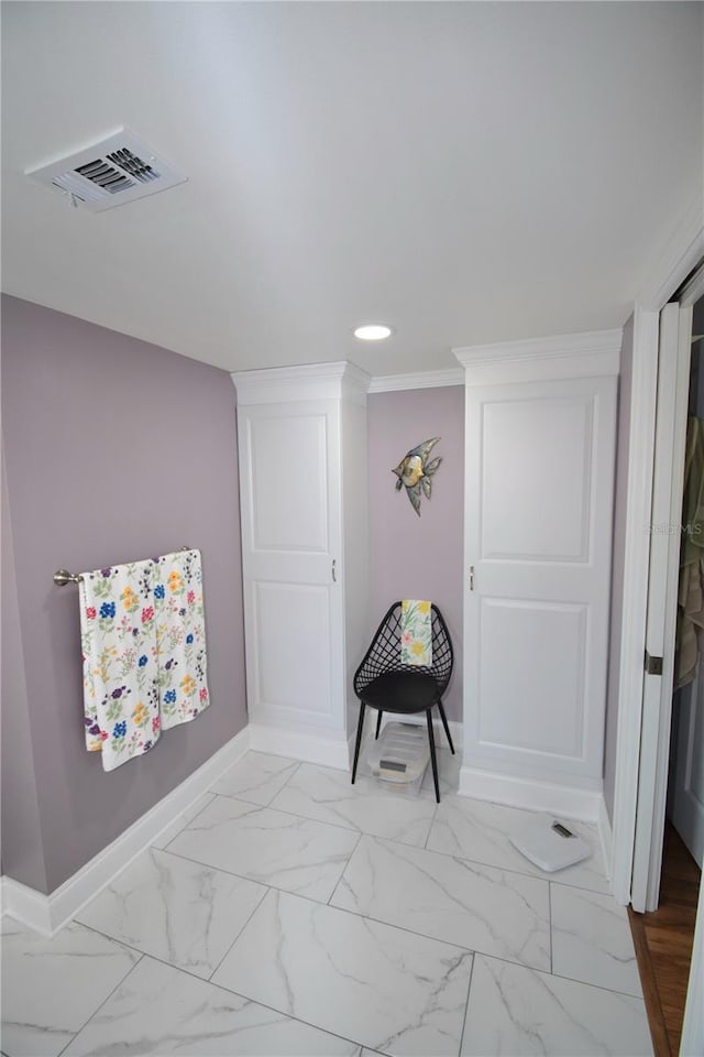 hallway with crown molding