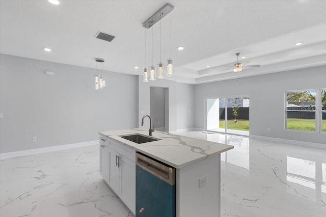 kitchen featuring white cabinetry, sink, hanging light fixtures, a kitchen island with sink, and stainless steel dishwasher