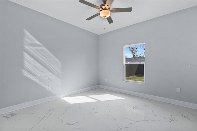 spare room featuring ceiling fan