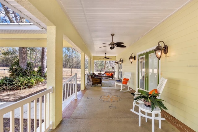 view of patio with an outdoor hangout area and ceiling fan