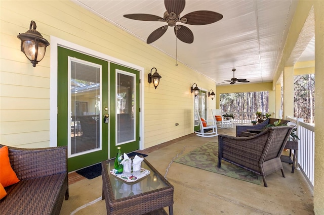 view of patio featuring ceiling fan and covered porch