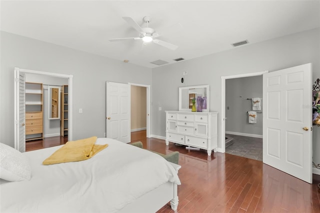 bedroom with ceiling fan and dark hardwood / wood-style floors