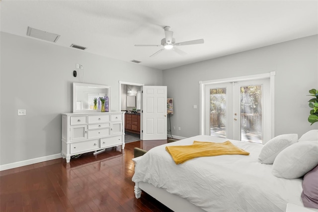 bedroom featuring dark hardwood / wood-style flooring, access to outside, ceiling fan, ensuite bath, and french doors