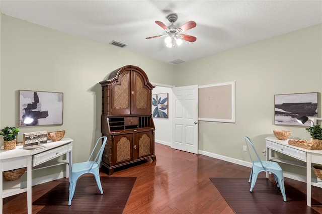 office area featuring ceiling fan and dark hardwood / wood-style floors