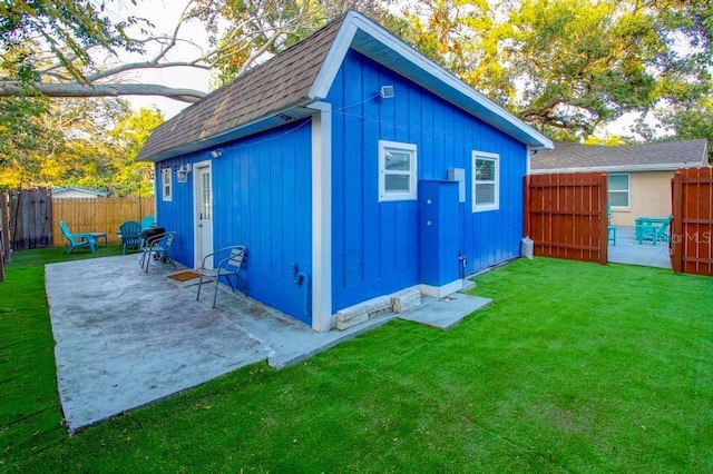 view of outbuilding with a fenced backyard