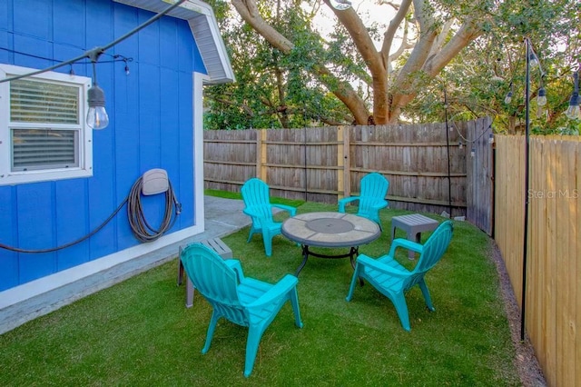 view of yard with a fenced backyard