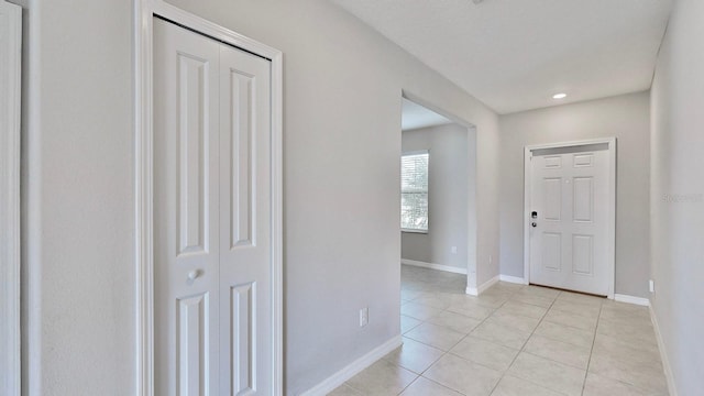 foyer featuring light tile patterned floors