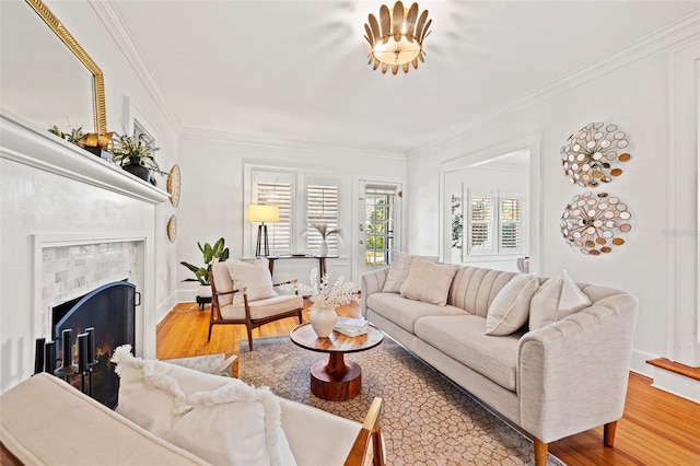 living room featuring crown molding and hardwood / wood-style floors