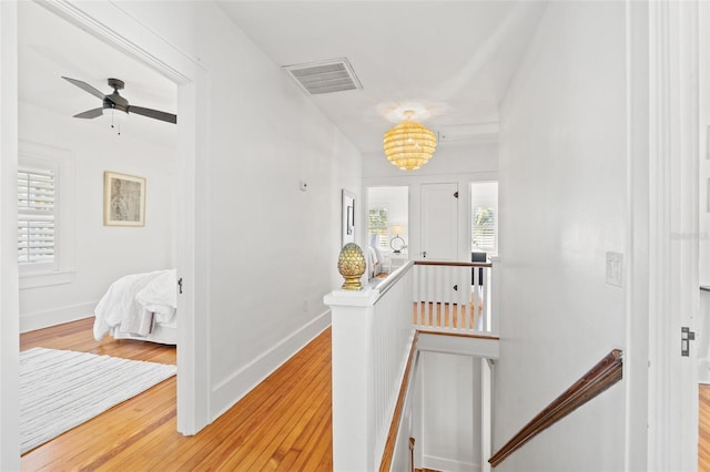 hall featuring wood-type flooring