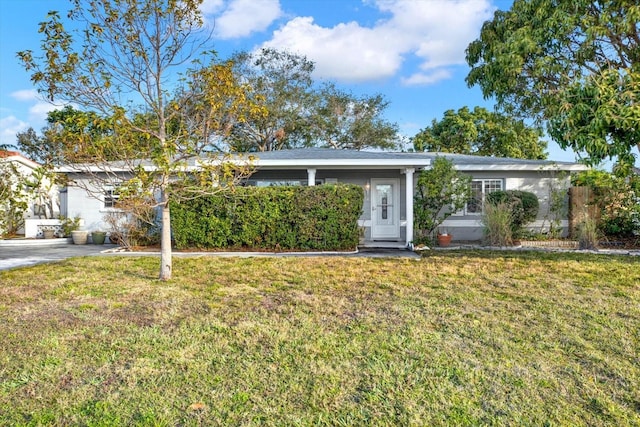 view of front of home with a front lawn