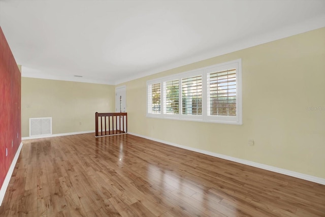 empty room featuring light hardwood / wood-style floors