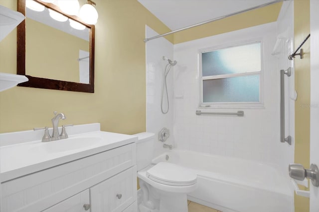 full bathroom with tiled shower / bath combo, vanity, and toilet