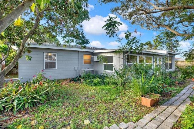 view of front of property featuring central air condition unit