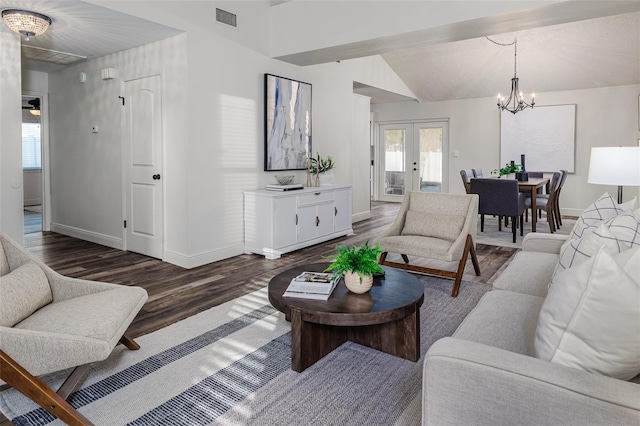 living room with french doors, dark hardwood / wood-style floors, an inviting chandelier, and vaulted ceiling with beams