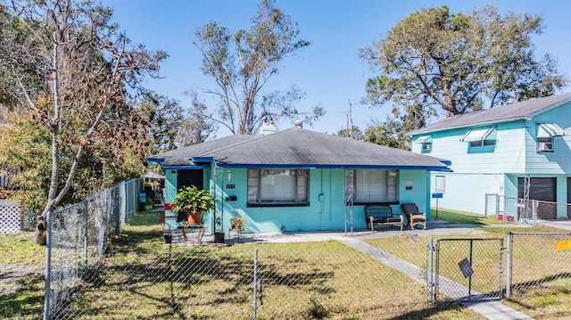 view of front of home with a front yard