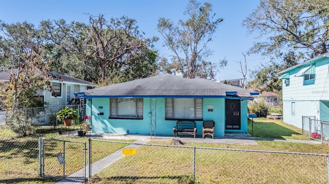 view of front of property with a front lawn