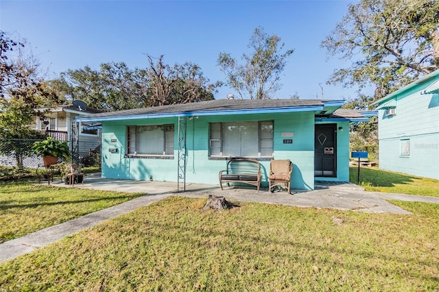 view of front of home with a front yard