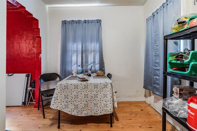 dining room with light hardwood / wood-style flooring