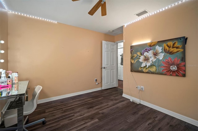 office space with dark wood-type flooring and ceiling fan