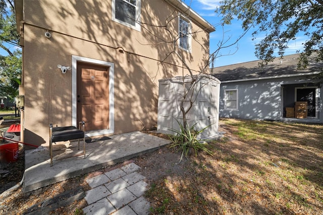 rear view of house featuring a patio area