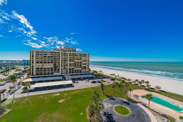 drone / aerial view with a view of the beach and a water view