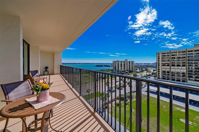 balcony featuring a water view