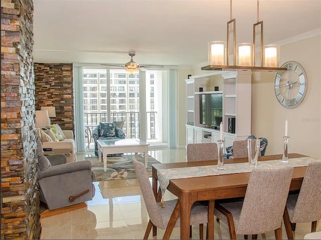 dining space featuring crown molding, ceiling fan, and light tile patterned flooring